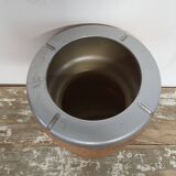 Bucket has champagne shape field cap