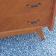 Commode vintage en chêne blond pieds compas 4 tiroirs 1950