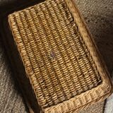 A large vintage rectangular wicker basket