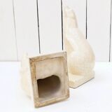 Cracked ceramic bookends with a couple of bears