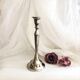 Chromed metal candle holder