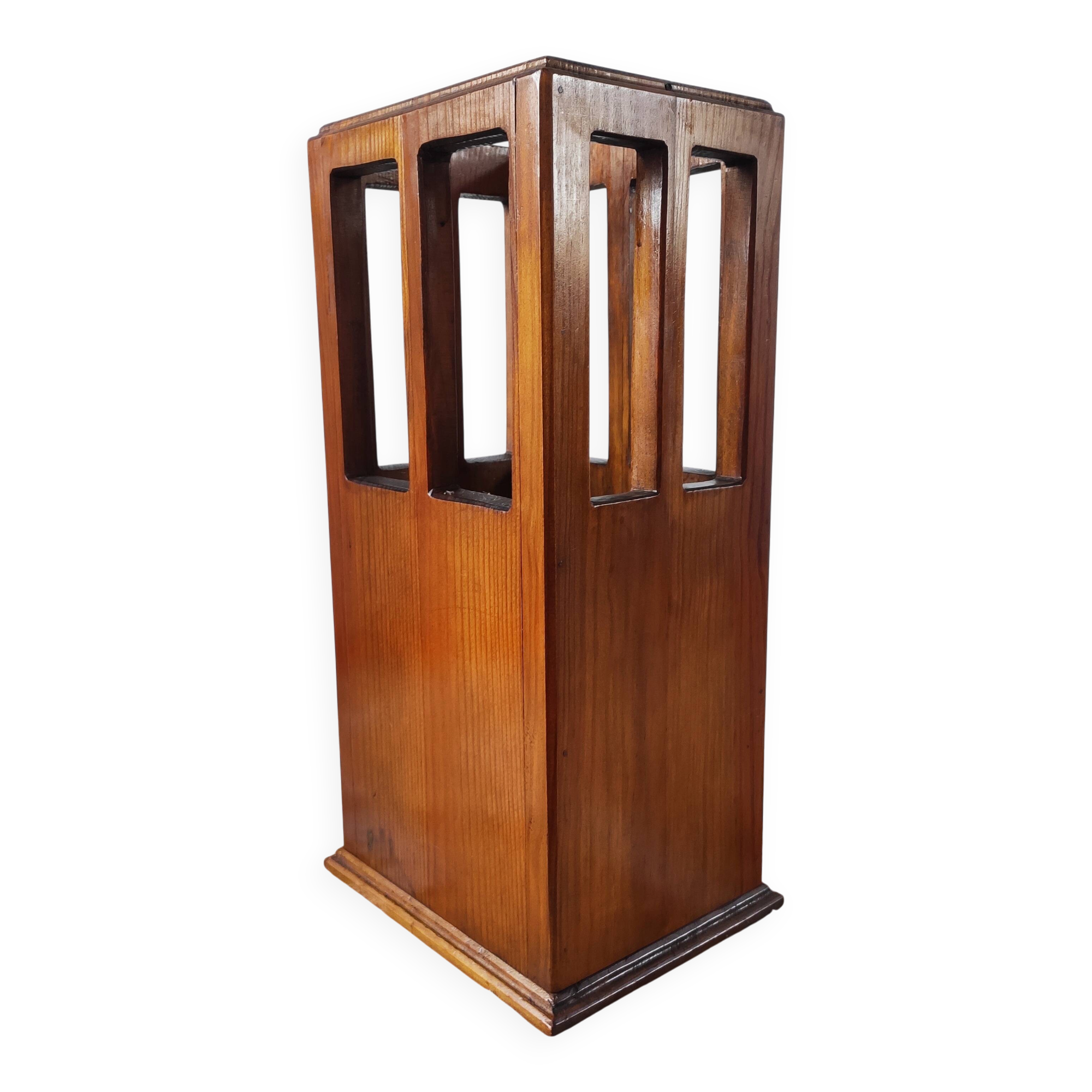 Vintage brutalist umbrella stand made of solid wood.