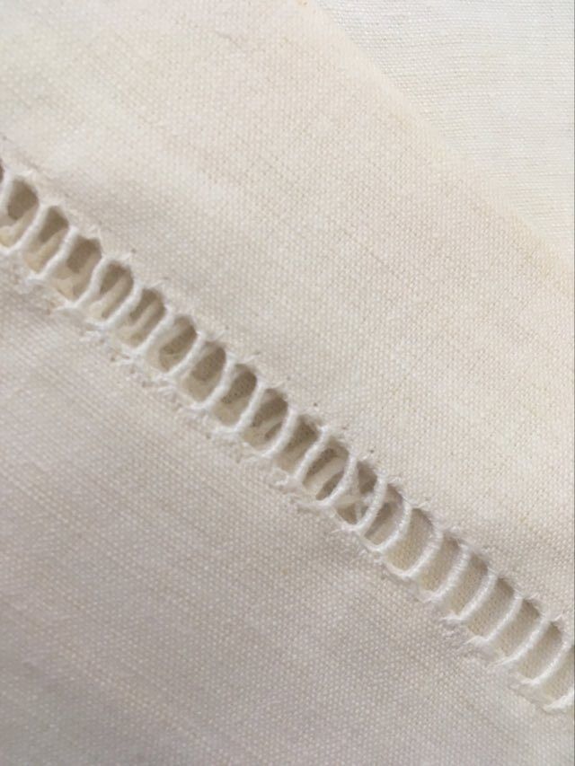 Two matching mixed pillowcases embroidered A B