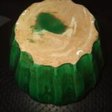 Green ceramic vase with a moist effect around 1930