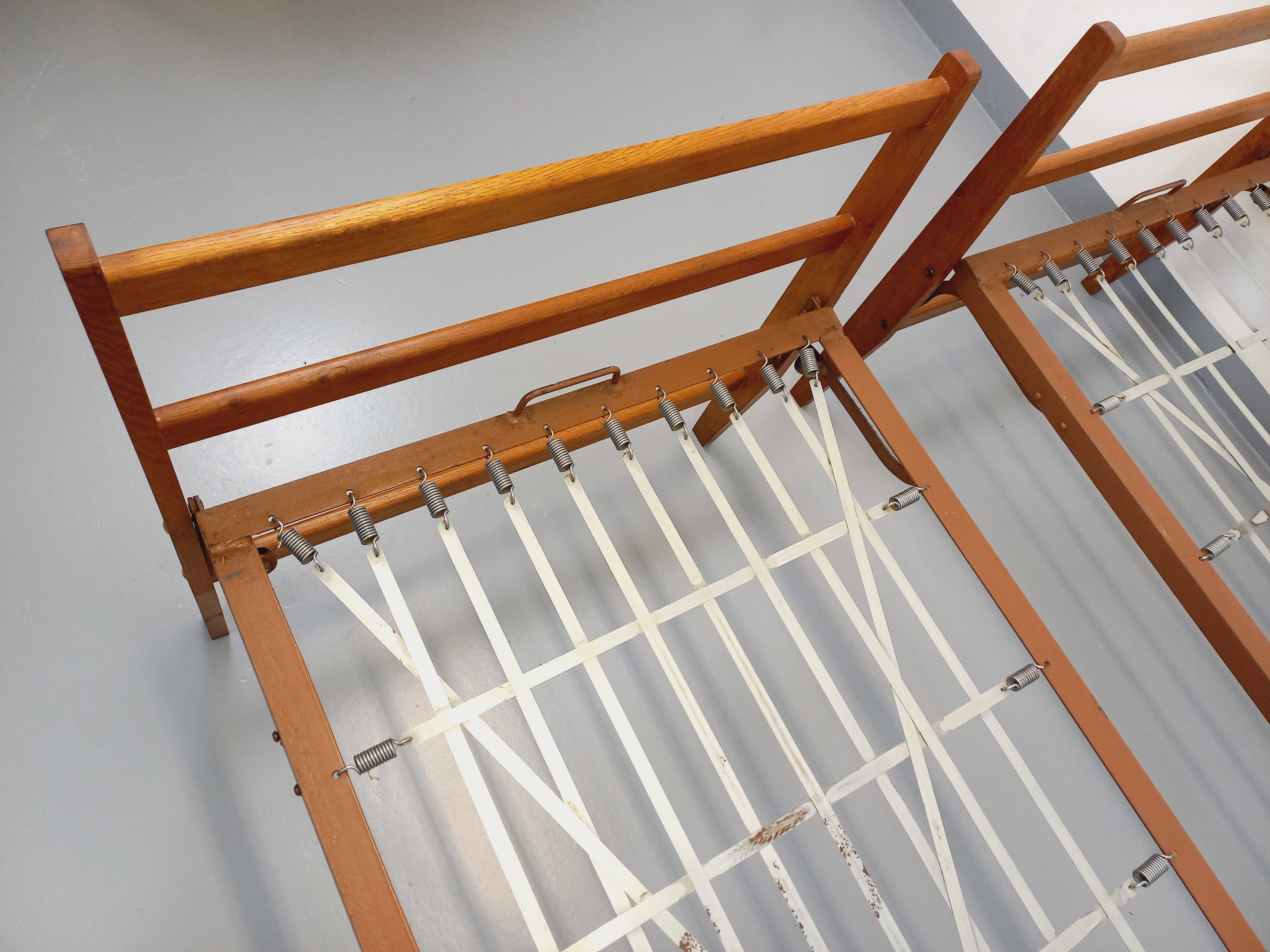 Pair of vintage stackable daybeds in oak wood and metal from the 60s