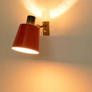 Old and rare Stilnovo wall light, red and black lacquered metal and brass With period label