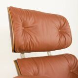 Lounge chair with footstool in aniline leather , 1970s