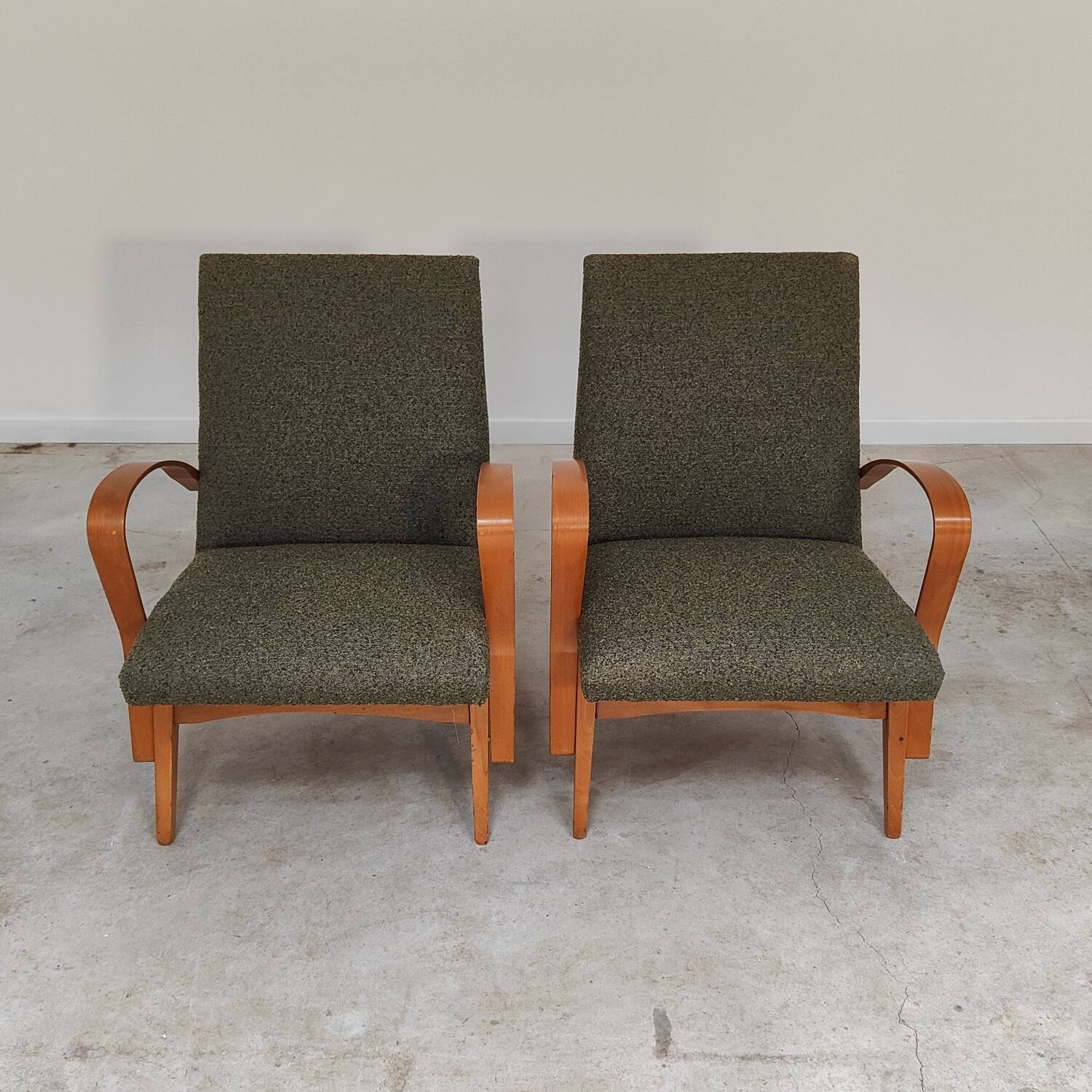 Pair of lounge chairs restored by Frantisek Jirak for Tatra