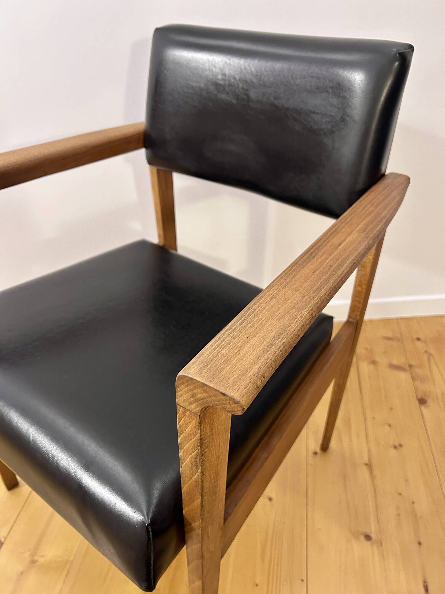 Mid-Century faux leather and wood armchair