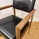 Mid-Century faux leather and wood armchair