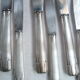Set of 10 silver metal knives