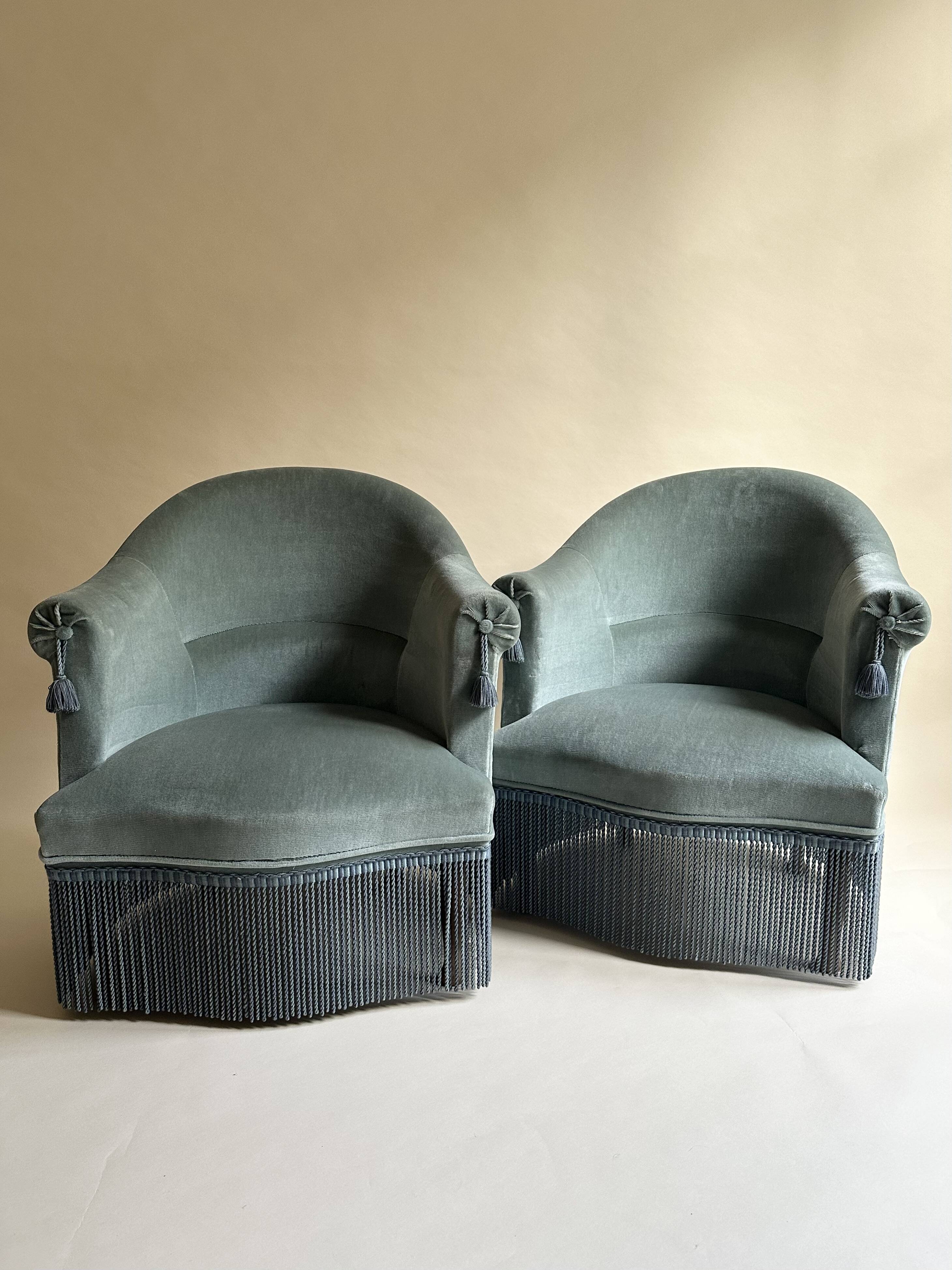Blue velvet frog armchairs