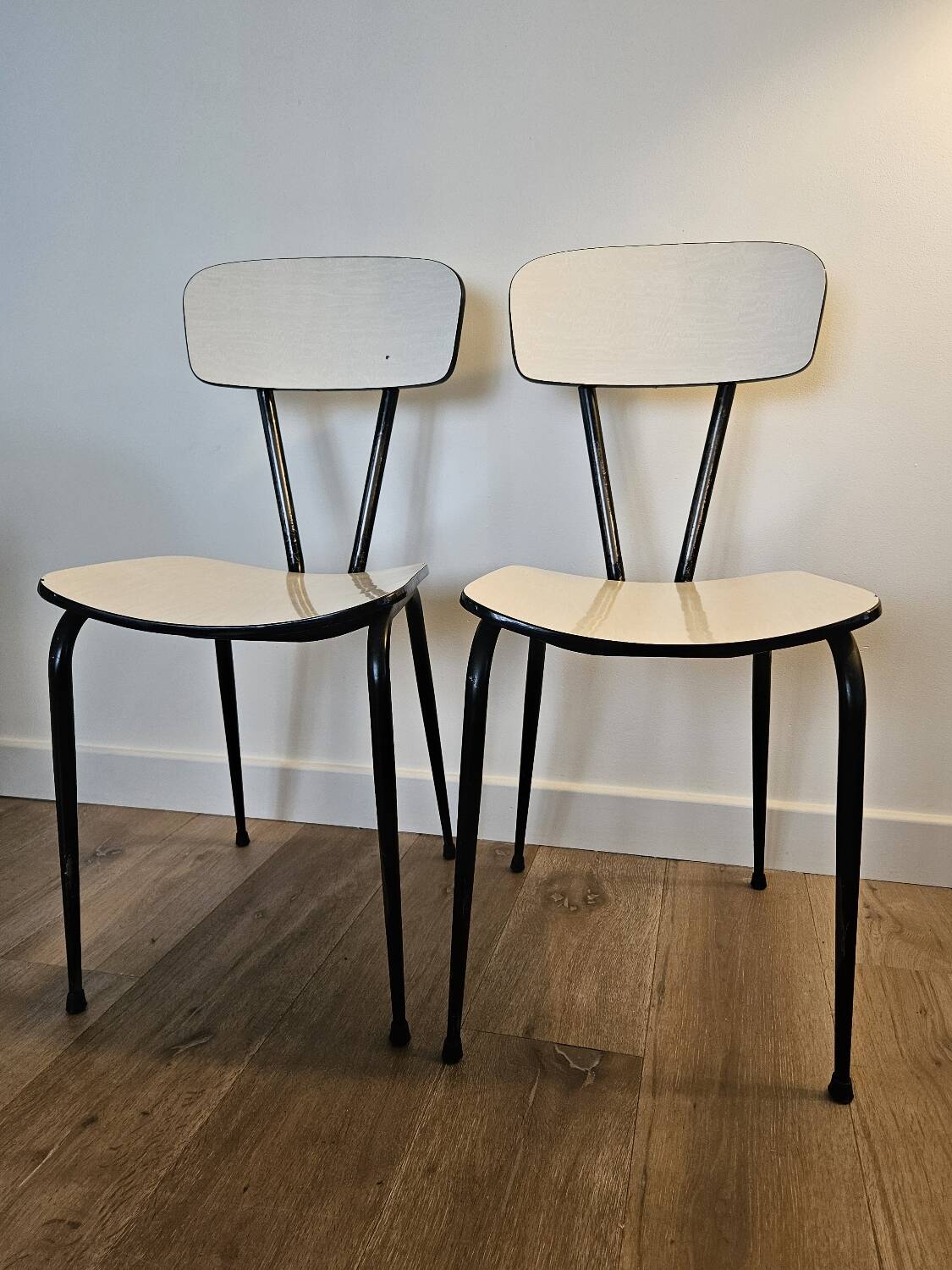Pair of white formica chairs