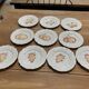 Set of 10 plates decorated with Sarreguemines porcelain fruit
