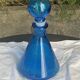 Blue bottle, glass vial for vintage perfume or liqueur.