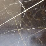 Solid walnut sideboard, moustache legs, black marble top.