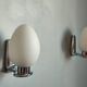 Pair of ouefs sconces in opaline and vintage chromed metal