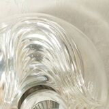 Sculptural wave wall lamp made of structured solid glass by peill & putzler
