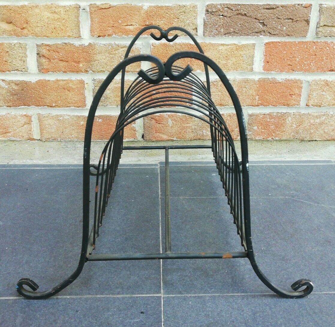 Vintage wrought iron magazine holder
