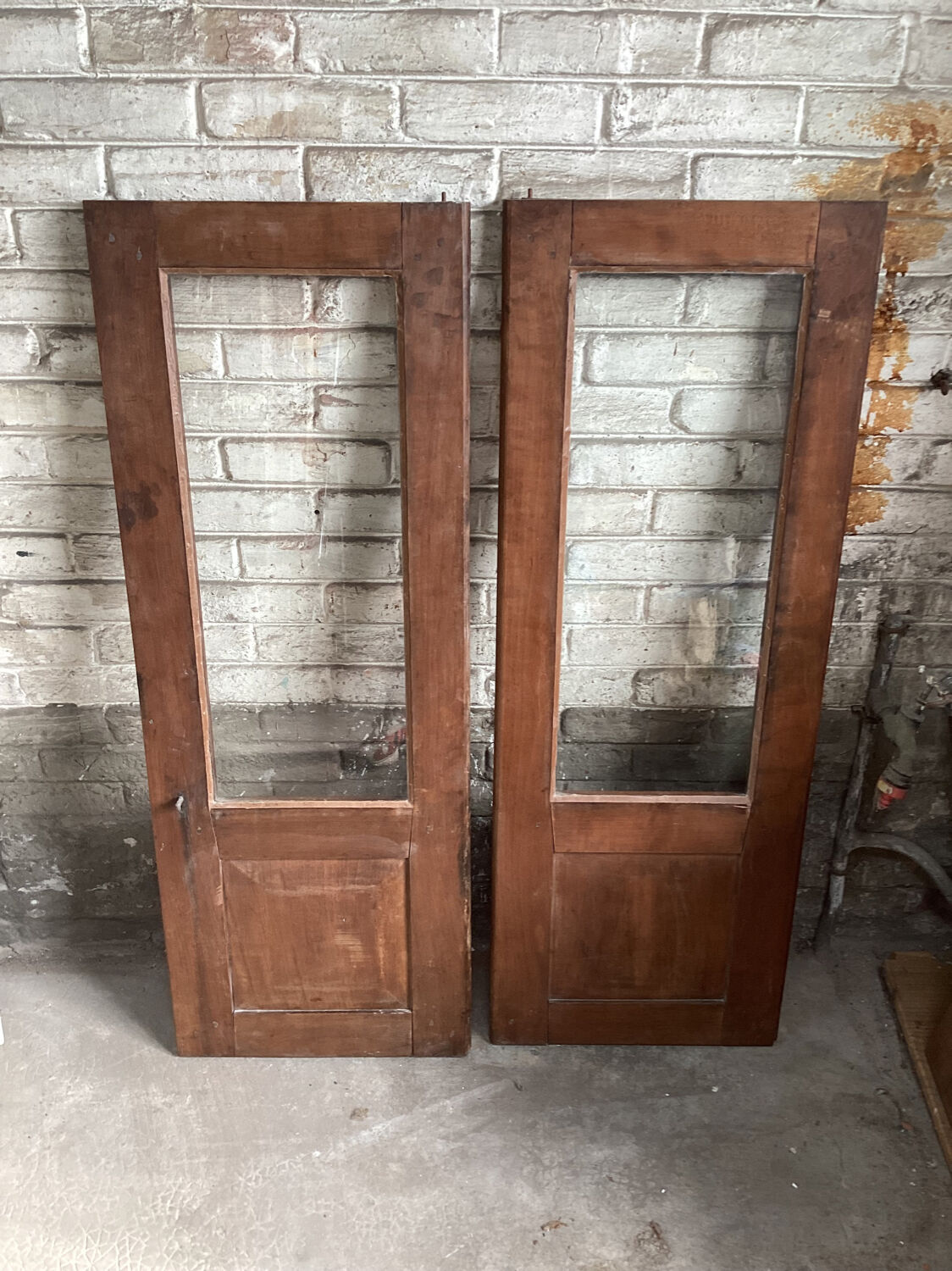Pair of old glass cupboard doors