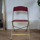 Chaise pliante en métal doré et velours rouge