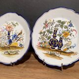 Pair of Nevers earthenware plates signed Georges
