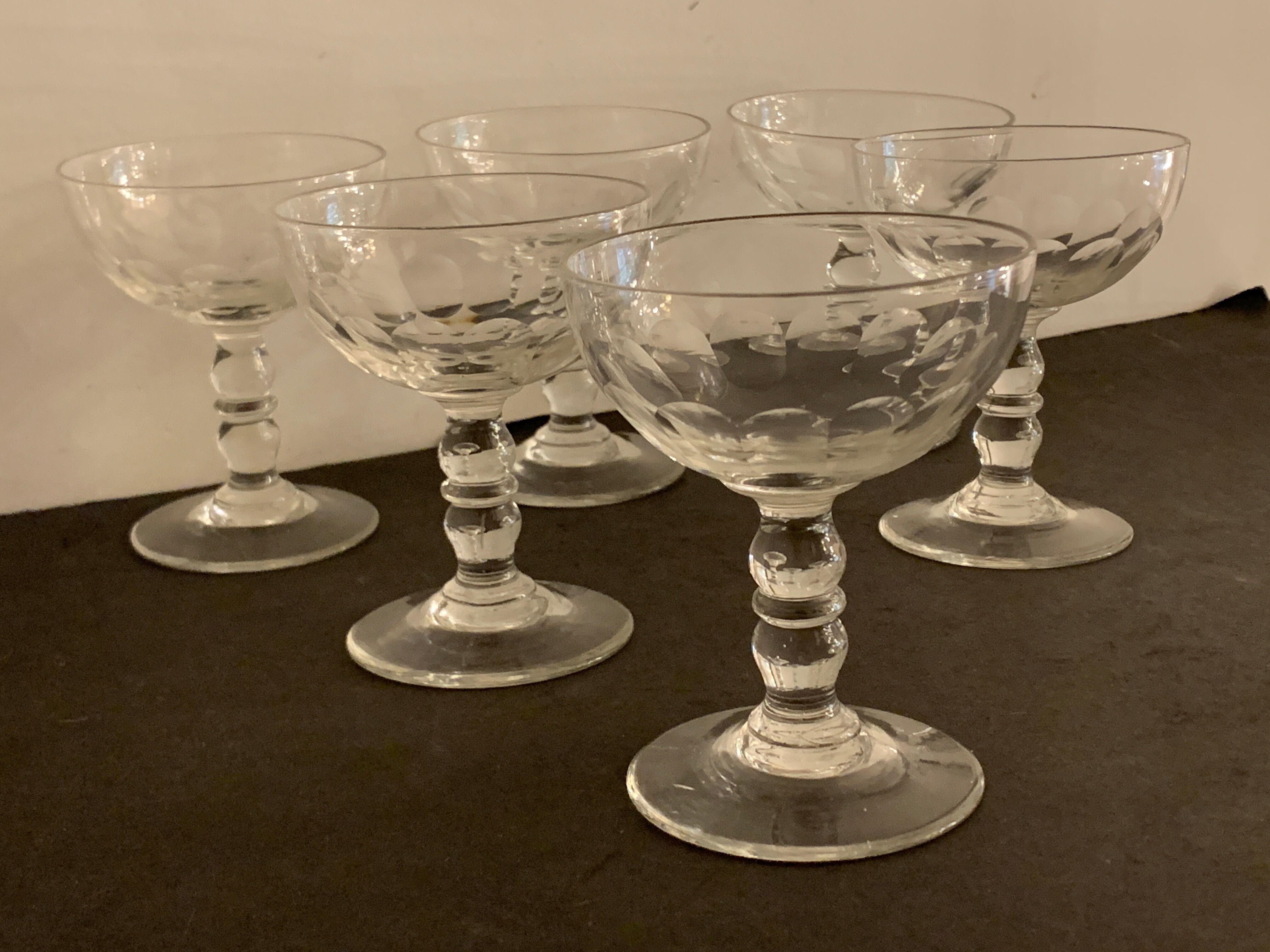 6 old champagne cups in faceted glass