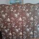 large antique headboard with 4 panels featuring Asian decor from the 1940s/50s