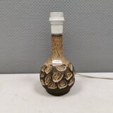 Small beautiful ceramic table lamp in earth colors.