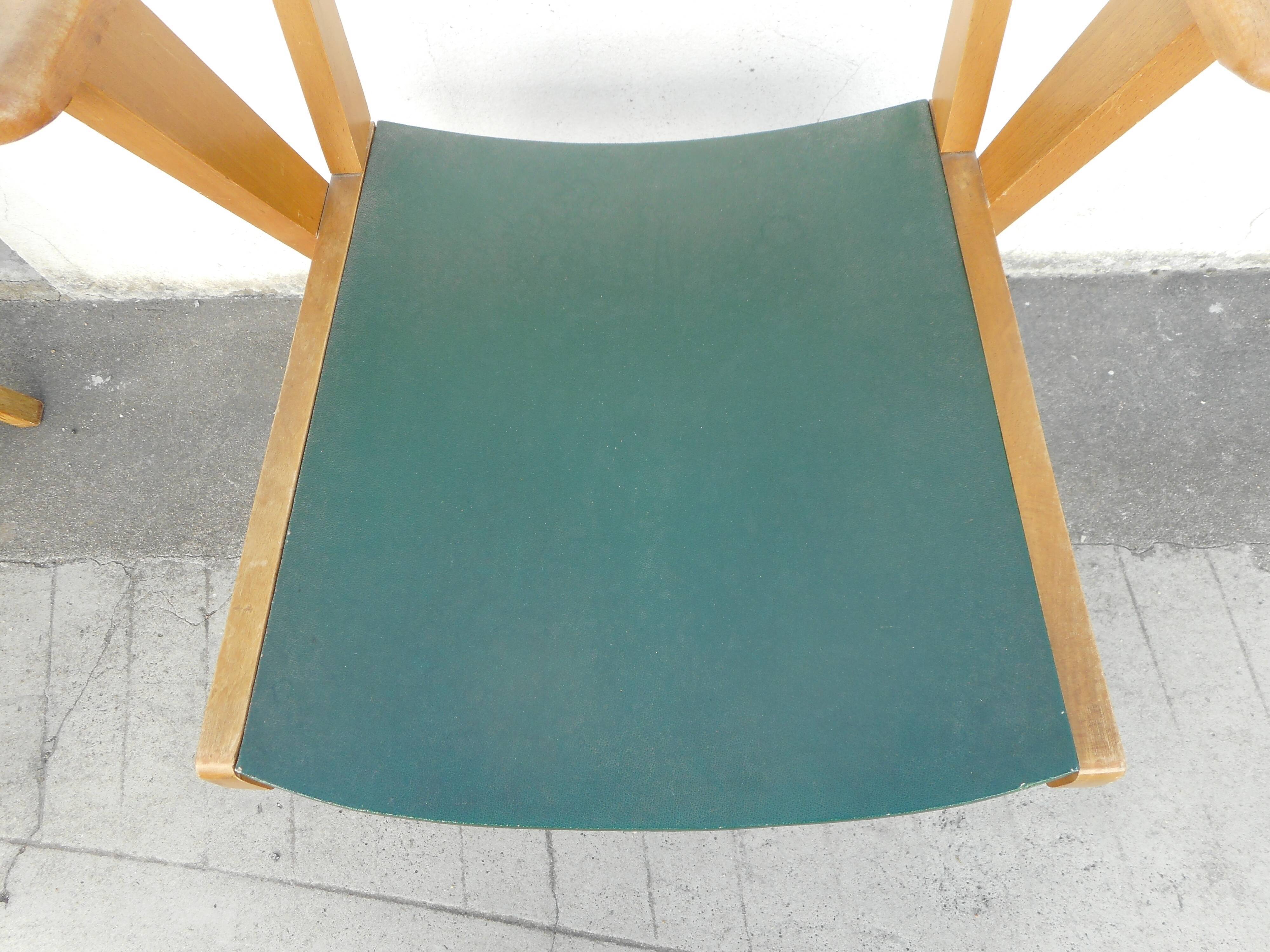 Pair of light wood armchairs