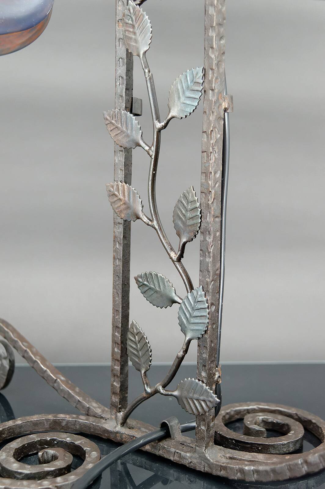 Two-headed wrought iron lamp by Muller, Art Deco, France, Circa 1920