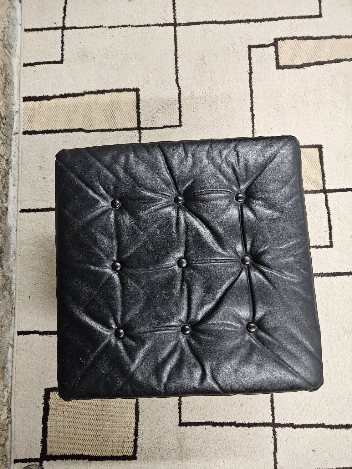 Black leather ottoman 1970 vintage