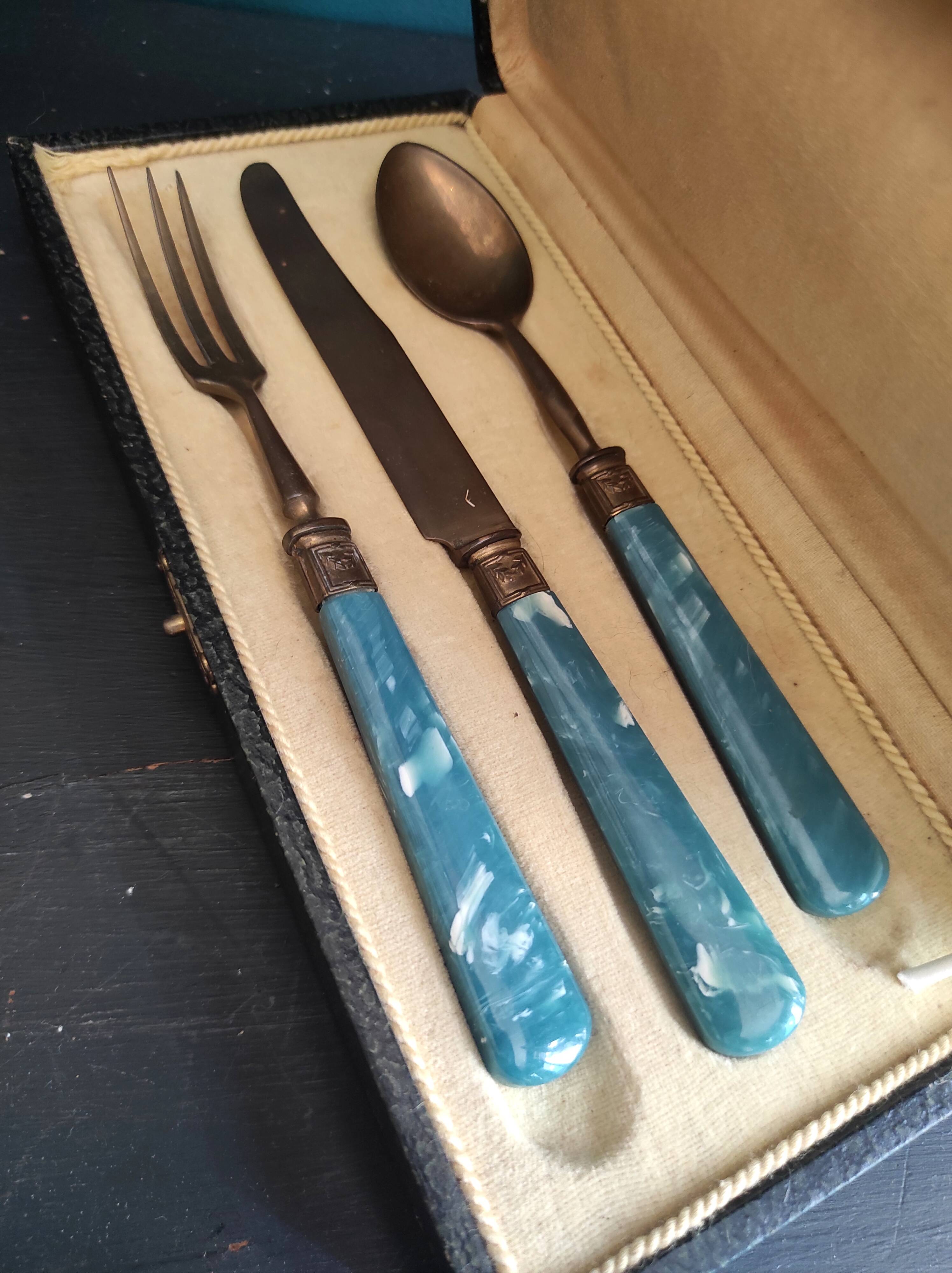 Vintage dessert cutlery set in blue bakelite