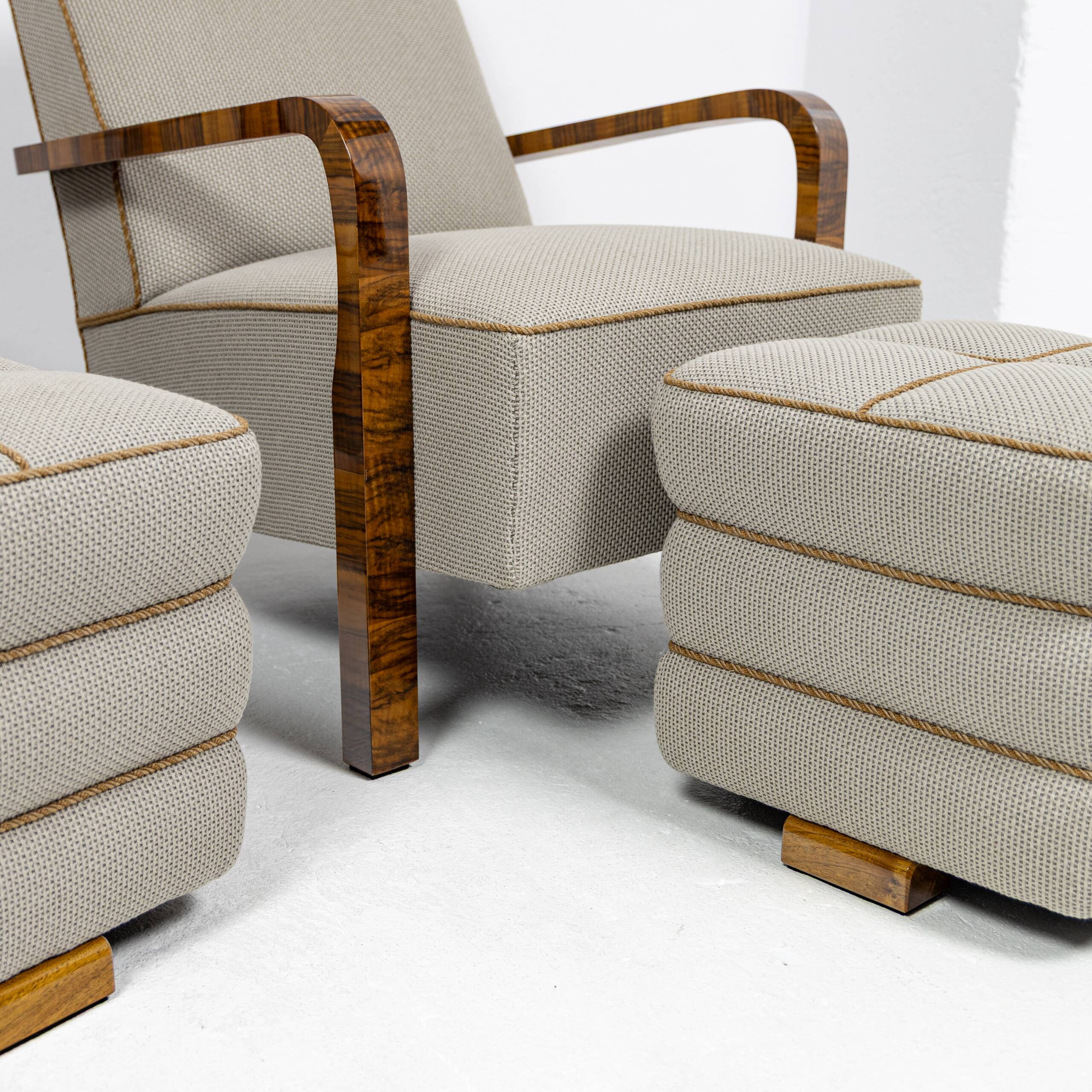 Pair of Art Deco armchairs and two poufs in walnut - 1930-1940