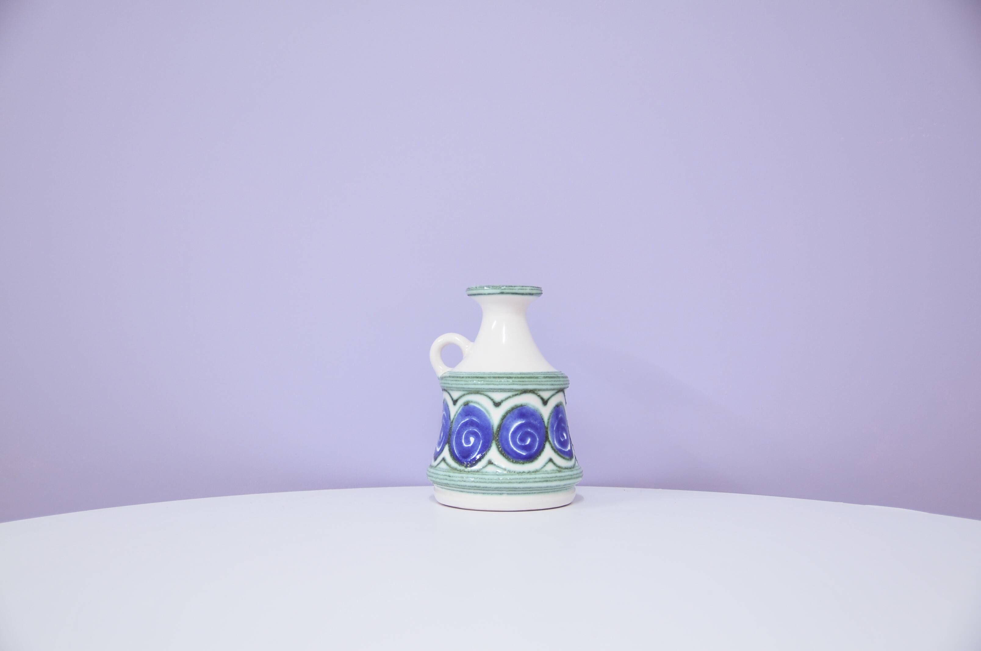 vintage white vase painted blue