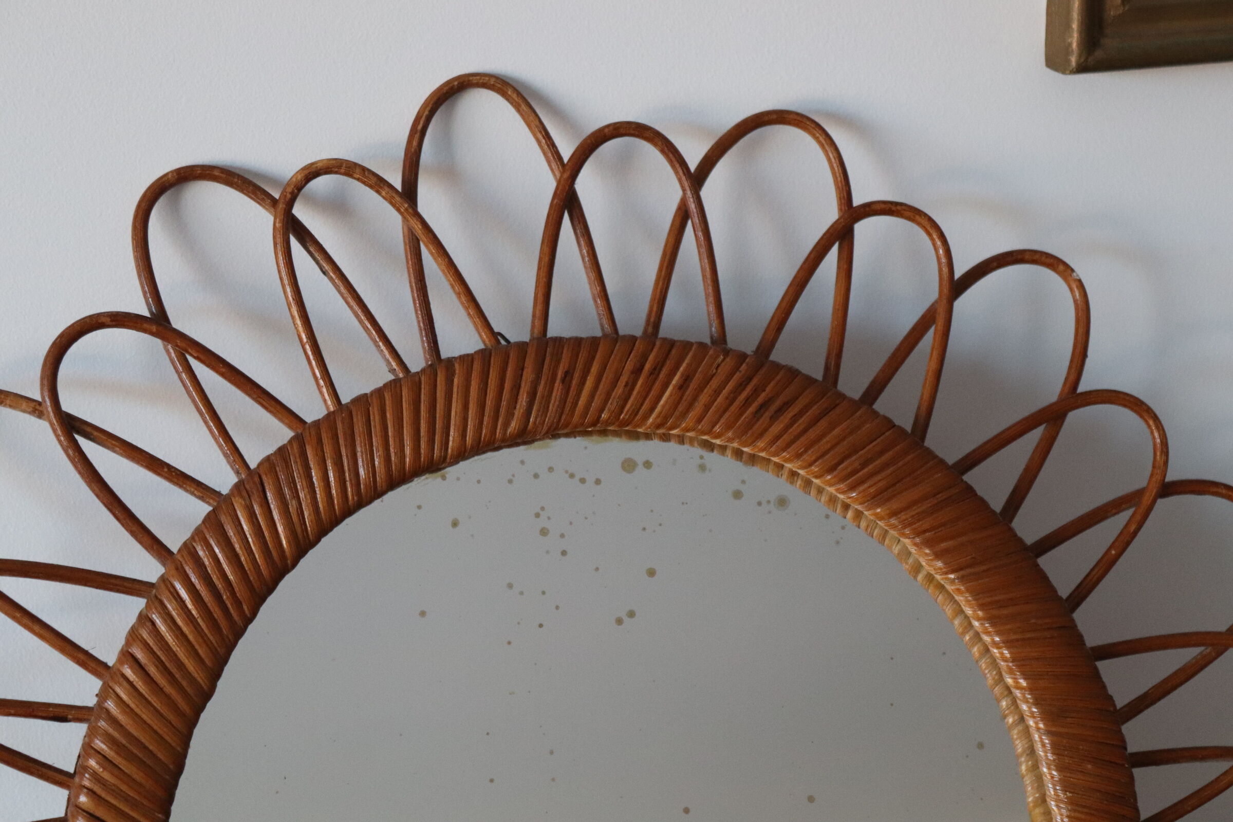 Vintage rattan sun mirror