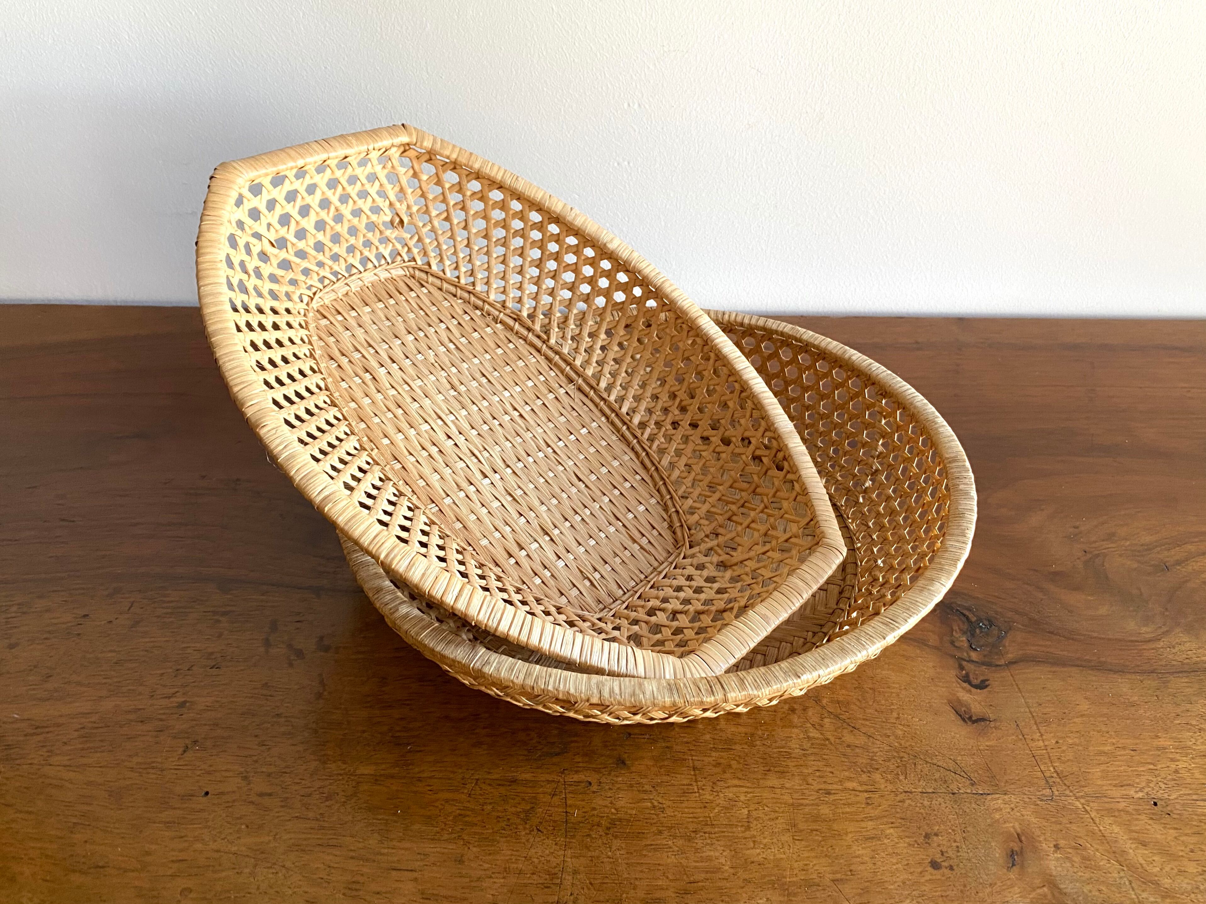 Pair of vintage braided rattan baskets