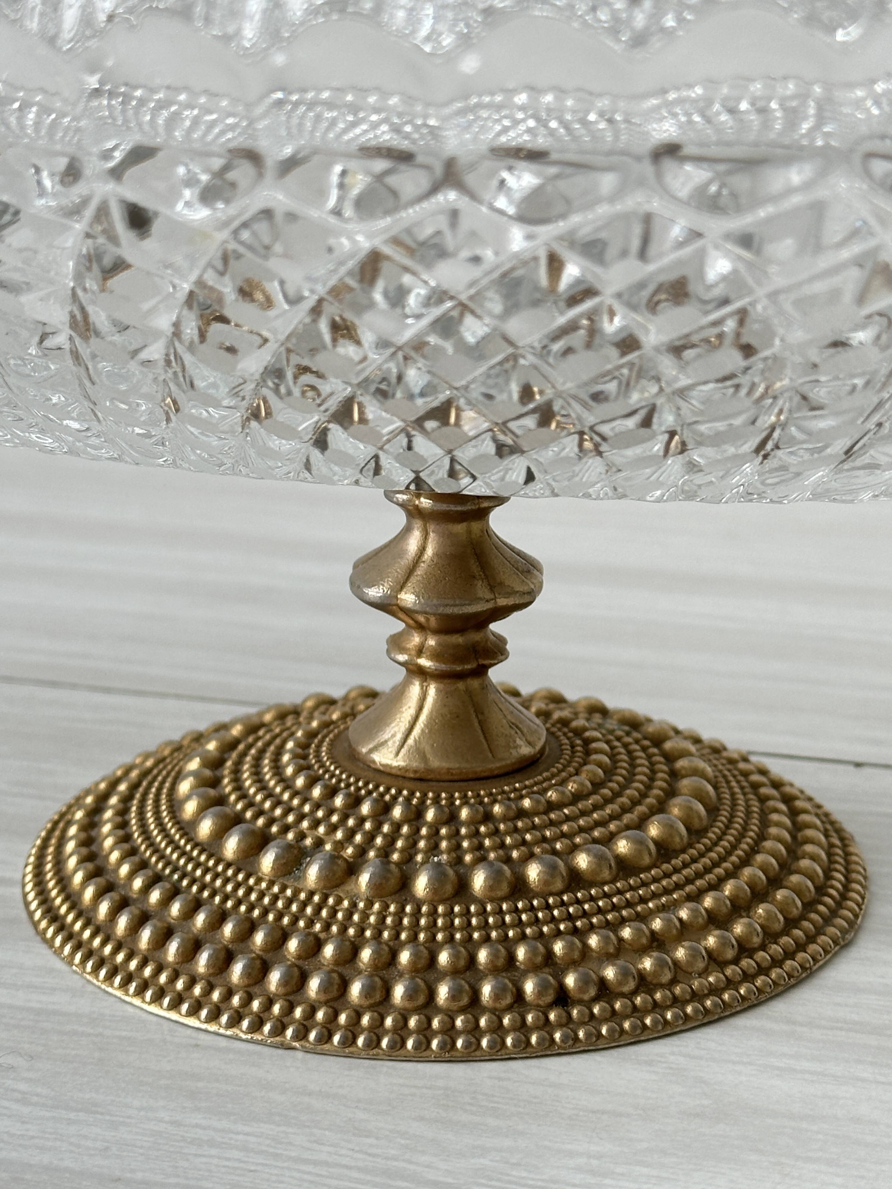 Molded glass bowl with gold metal base