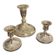Series of 3 vintage candle holders in silver metal 70s