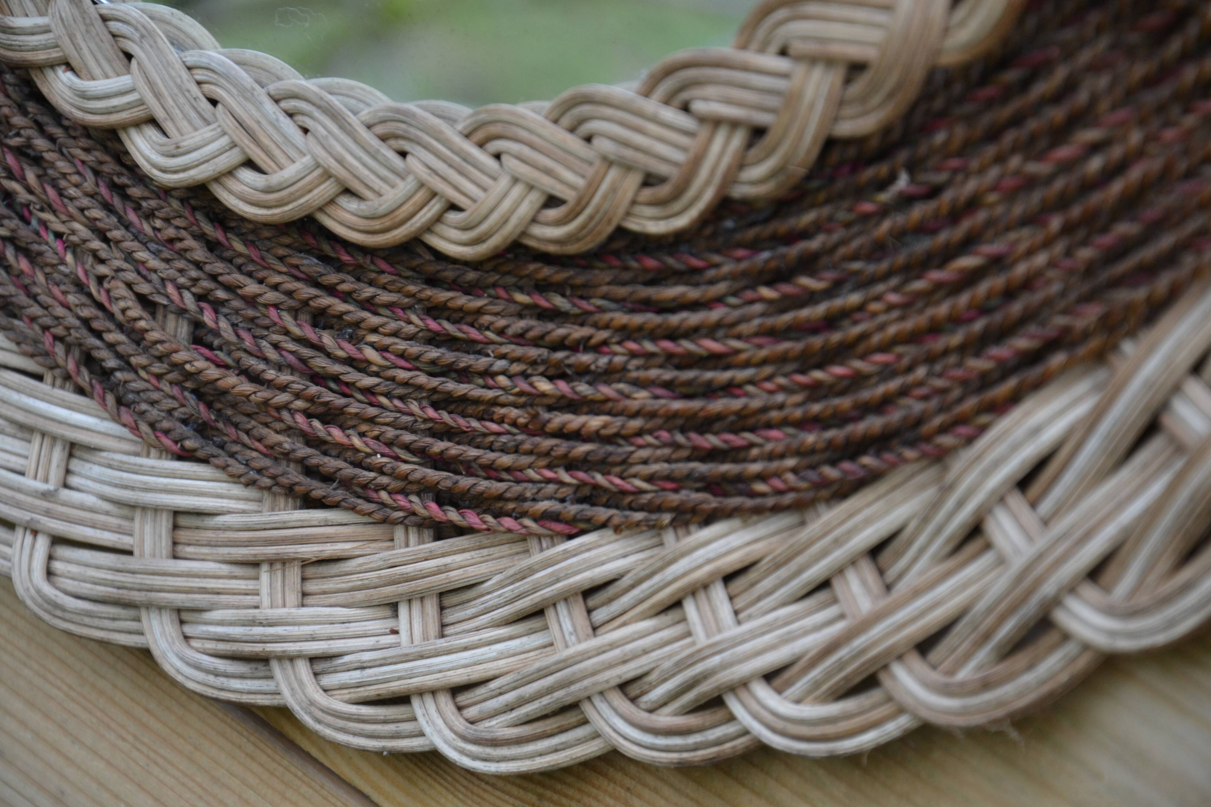 Round woven rattan mirror with rope from the 1970s.