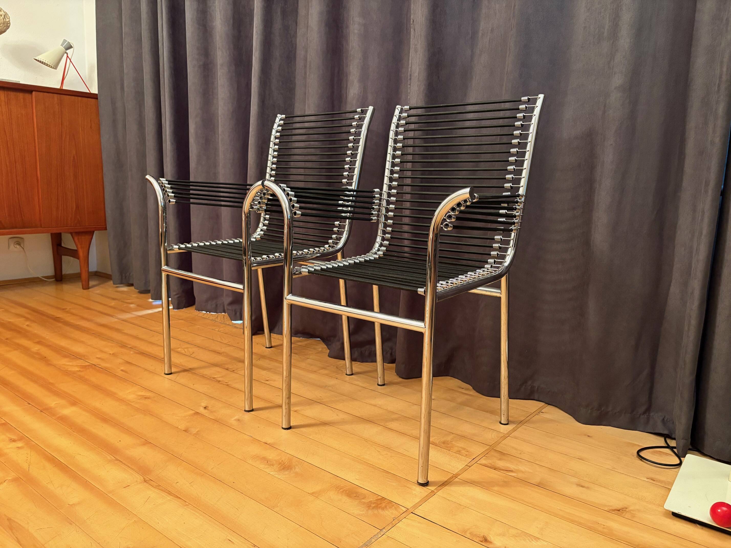 Pair of "Sandows" chairs designed by Rene Herbst, Bauhaus, France, 1980s