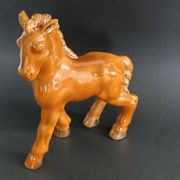 Ceramic horse sculpture with wild glaze and gold, signed Art Deco.