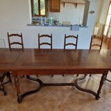 Marquetry wooden dining table with its 6 chairs.