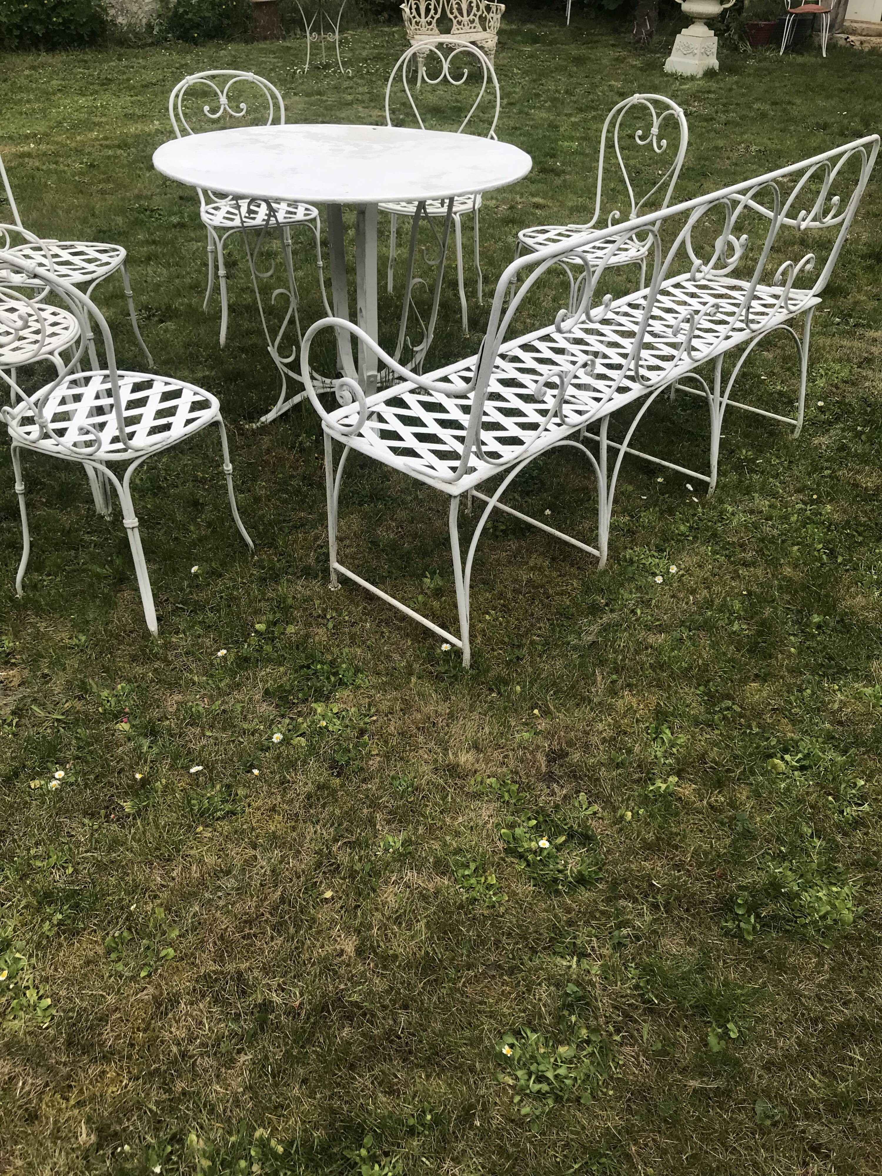 Antique wrought iron garden furniture
