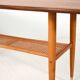 Coffee table in teak with boat shape