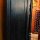 Curtained cabinet, late 19th century.