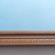 Louis XVI mirror in carved wood, 19th century.