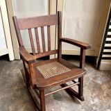 Children's rocking chair in dark wood and cane