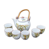 Vintage tea service in ceramic and rattan