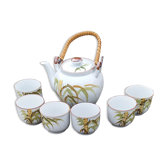 Vintage tea service in ceramic and rattan